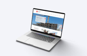 Webseite der Baugenossenschaft Familienheim Bodensee mit Startbild „Bauprojekt Aacher Straße in Engen“ auf einem Laptop